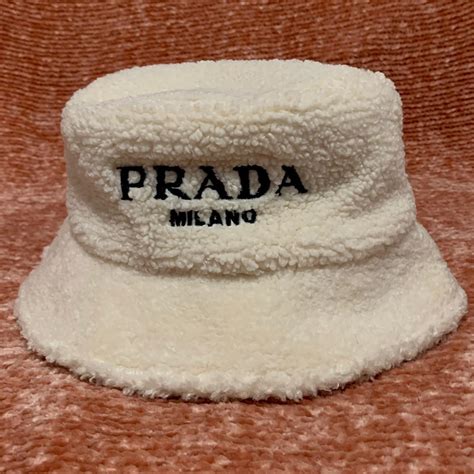 prada cream bucket hat|Prada fluffy bucket hat.